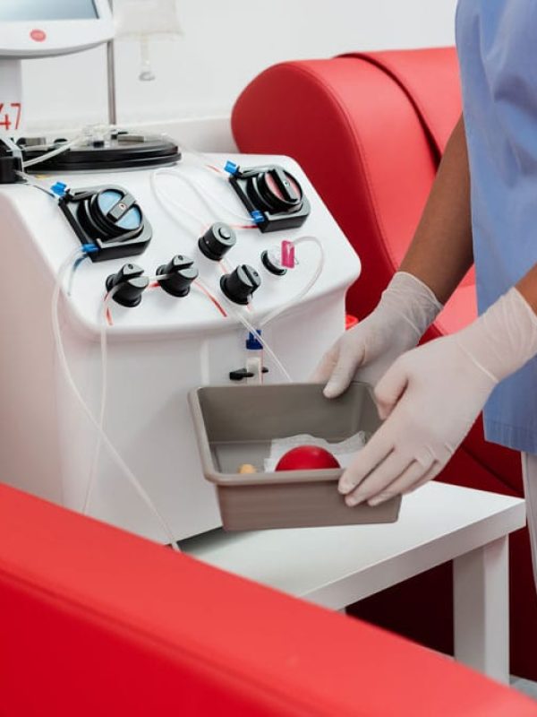 cropped-view-of-multiracial-nurse-in-blue-uniform-2024-11-11-09-00-19-utc